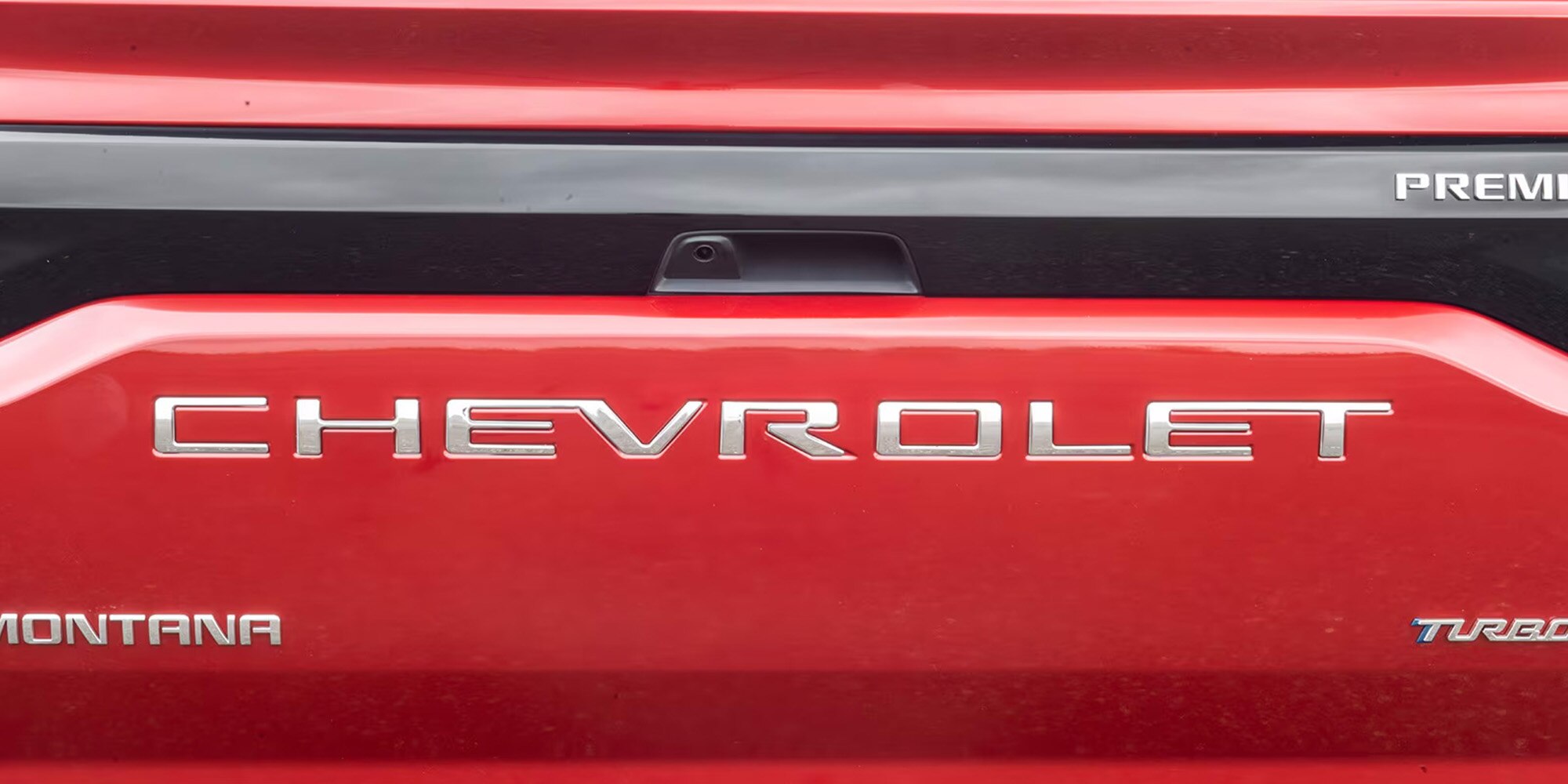 Emblema trasero cromado